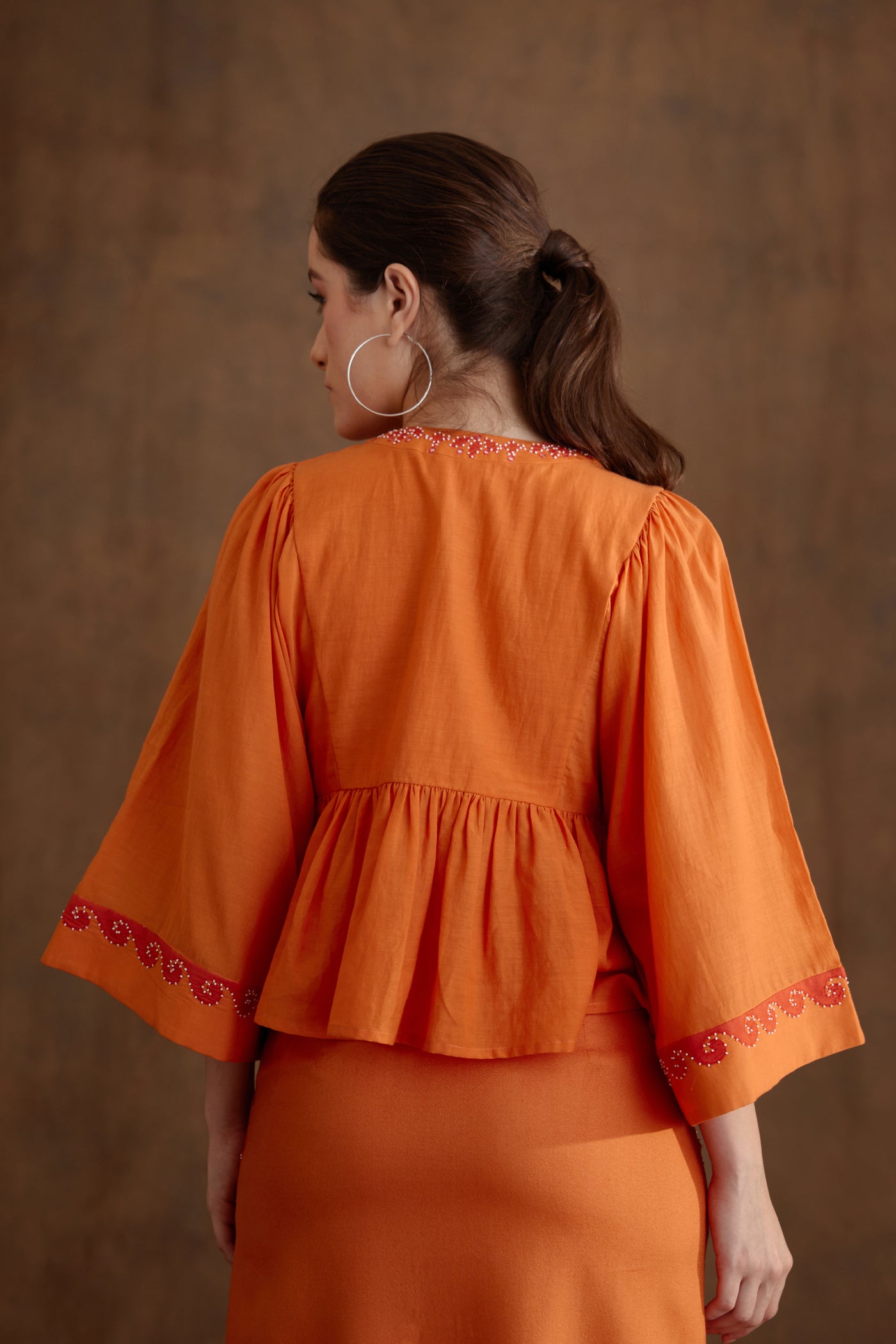 Nikasha Saffron Applique Embroidered Top Indian designer wear online shopping melange singapore