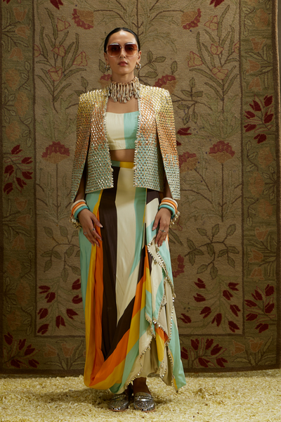 SVA Womenswear Multi Colored Metallic Cape Jacket Paired with Stripe Printed Bustier and Drape Skirt Indian Designer Wear Online Shopping Melange Singapore