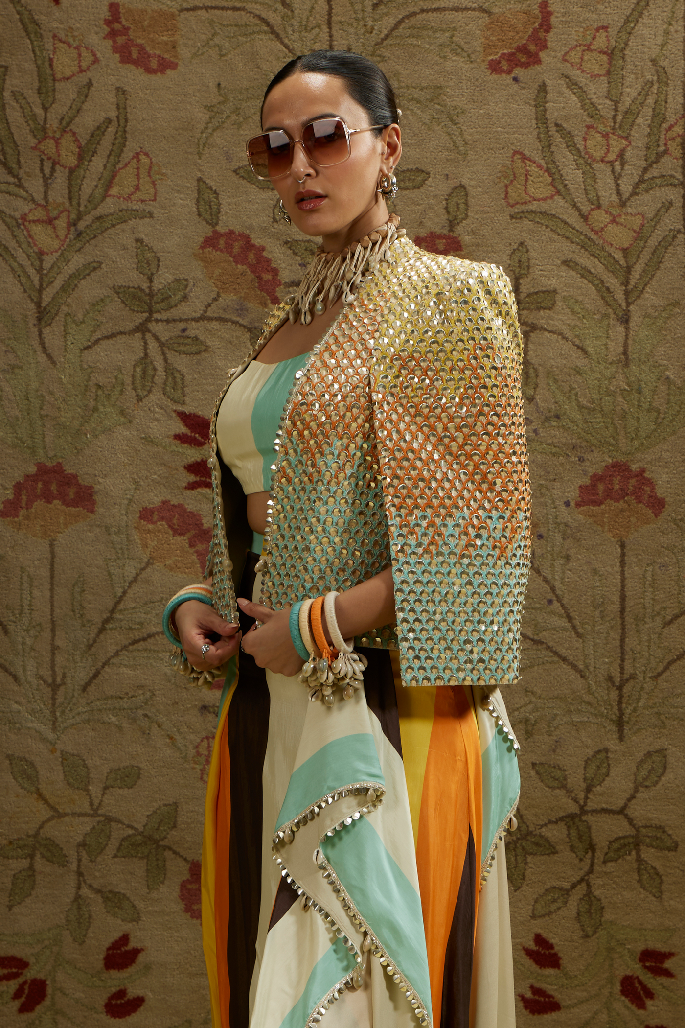 SVA Womenswear Multi Colored Metallic Cape Jacket Paired with Stripe Printed Bustier and Drape Skirt Indian Designer Wear Online Shopping Melange Singapore