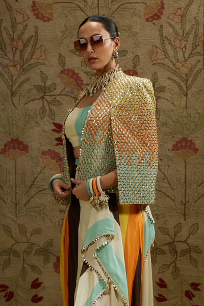 SVA Womenswear Multi Colored Metallic Cape Jacket Paired with Stripe Printed Bustier and Drape Skirt Indian Designer Wear Online Shopping Melange Singapore