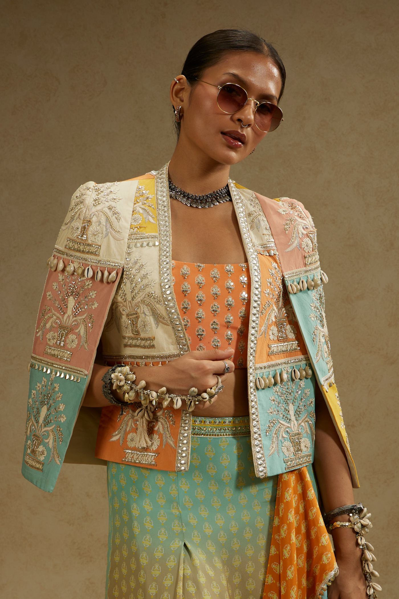Patchwork Cape Jacket Paired with Bustier and Orange Blue Ombre Print Drape Skirt
