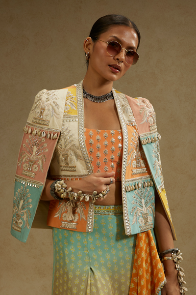 Patchwork Cape Jacket Paired with Bustier and Orange Blue Ombre Print Drape Skirt