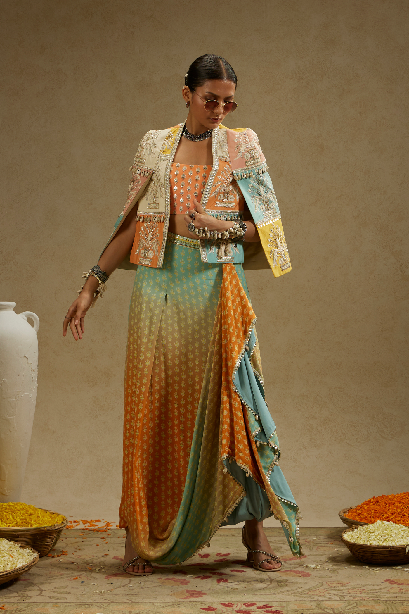 Patchwork Cape Jacket Paired with Bustier and Orange Blue Ombre Print Drape Skirt