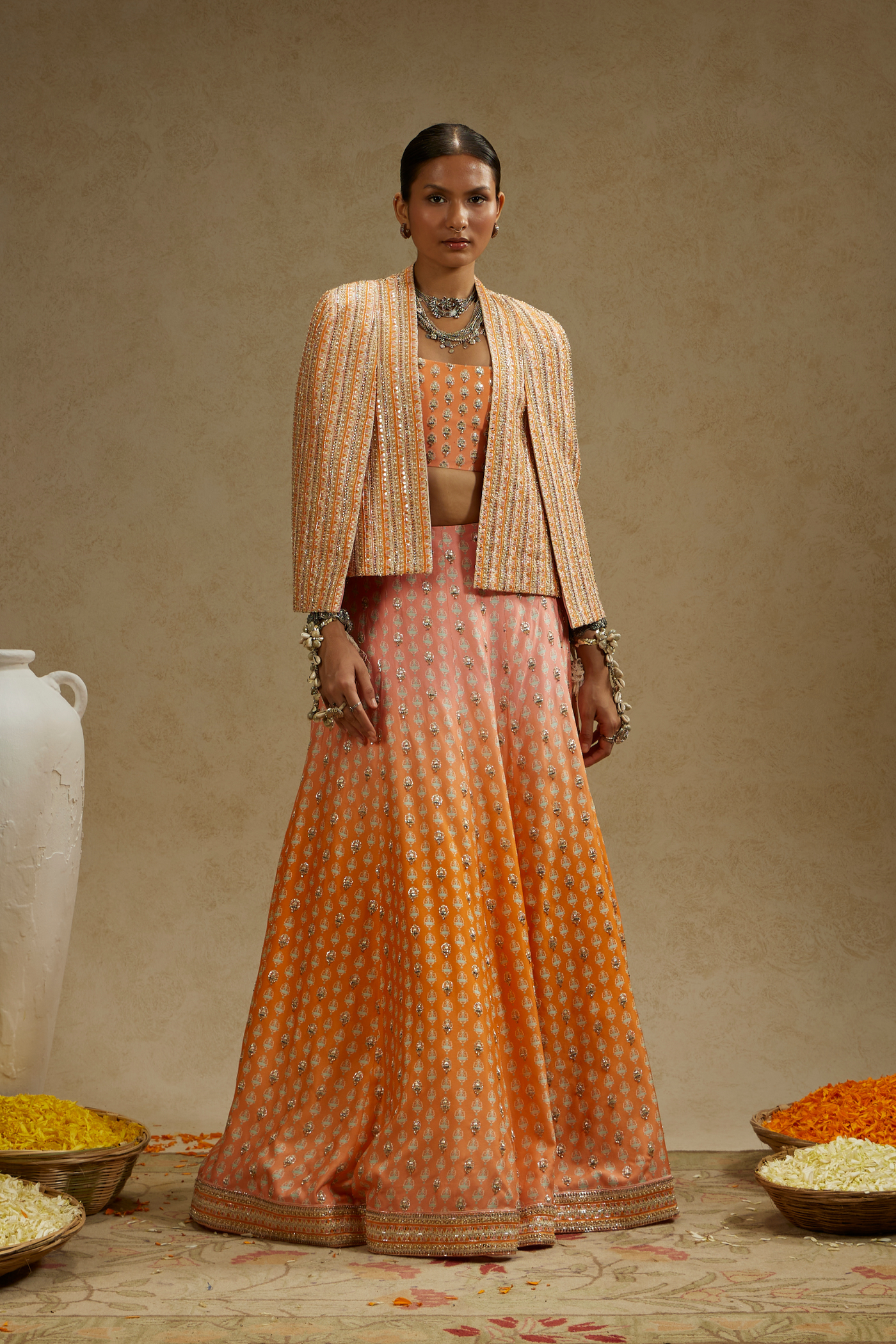 SVA Pink Embellished Cape Jacket Paired with Ombre Print Embellished Bustier and Ombre Embellished Lehenga Womenswear Melange Singapore Online Shopping Indian Designer Wear