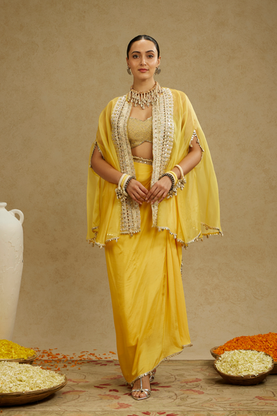 SVA Womenswear Metal Embellished Bustier Paired with Organza Cape and Dandelion Yellow Drape Skirt Online Shopping Melange Singapore Indian Designer Wear