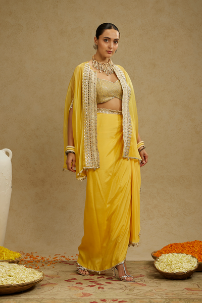 SVA Womenswear Metal Embellished Bustier Paired with Organza Cape and Dandelion Yellow Drape Skirt Online Shopping Melange Singapore Indian Designer Wear