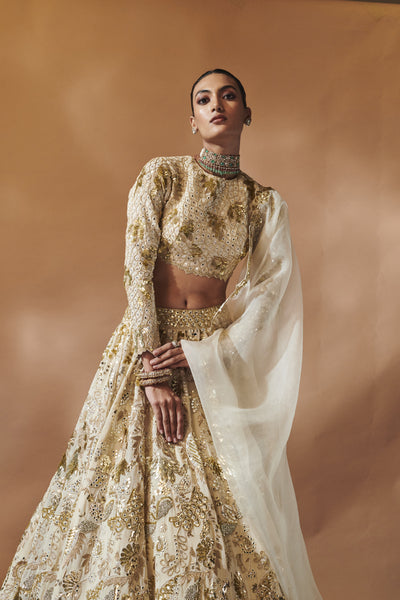 Tamanna Punjabi Kapoor Ivory And Gold Heavily Embroidered Lehenga Set indian designer wear online shopping melange singapore