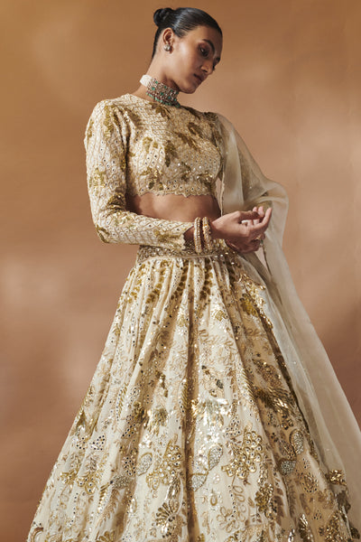 Tamanna Punjabi Kapoor Ivory And Gold Heavily Embroidered Lehenga Set indian designer wear online shopping melange singapore
