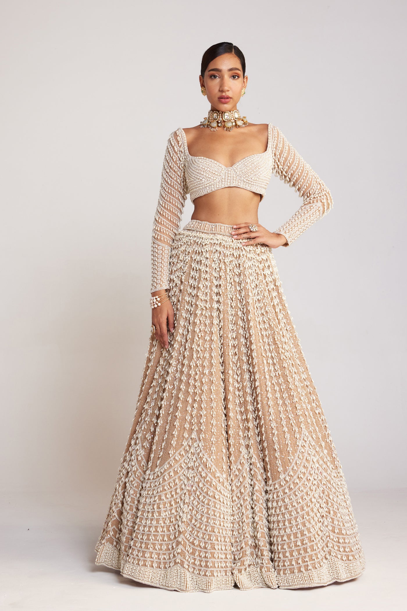 V Vani Vats Beige Chandelier Pearl Lehenga Paired With Full Sleeve Pearl Drop Blouse Indian designer wear online shopping melange singapore