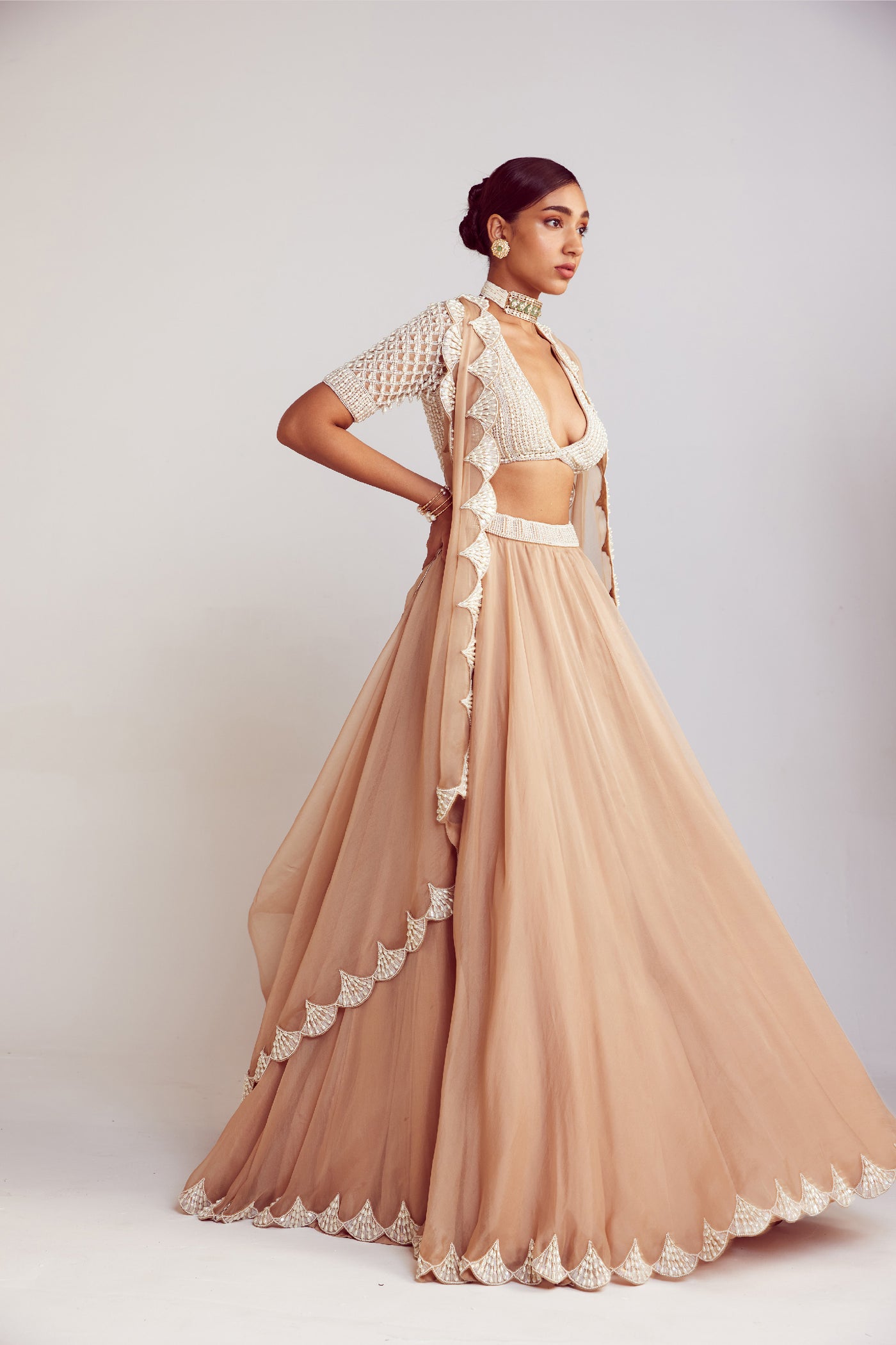 V Vani Vats Beige Pearl Embellished Organza Lehenga Paired With V Neck Blouse With Elbow Sleeves Indian designer wear online shopping melange singapore