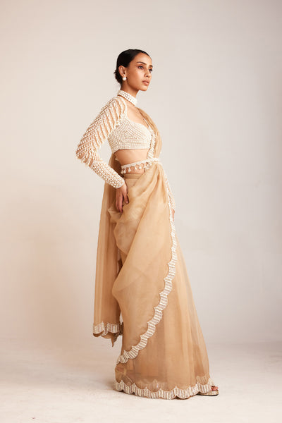 V Vani Vats Beige Pearl Embellished Saree Paired With Pearl Drop Full Sleeve Blouse Indian designer wear online shopping melange singapore