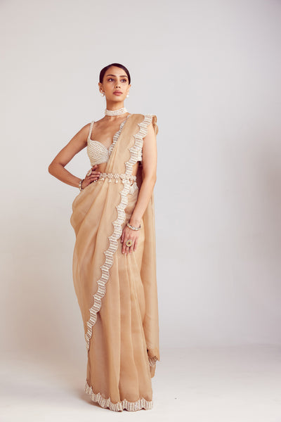 V Vani Vats Beige Pearl Embellished Saree Paired With Sweetheart Neck Blouse Indian designer wear online shopping melange singapore