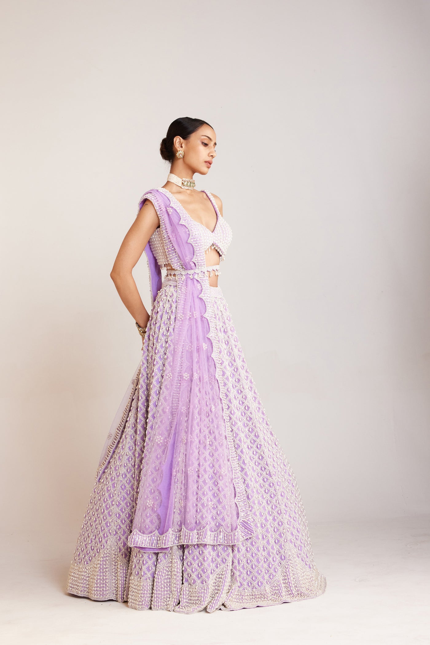 V Vani Vats Lilac Pearl Drop Lehenga Paired With Heavily Embellished Sweetheart Neck Blouse Indian designer wear online shopping melange singapore