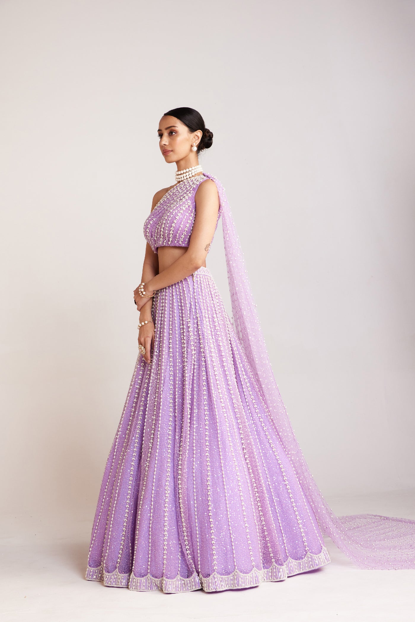 V Vani Vats Lilac Pearl Embellished Lehenga Paired With One Shoulder Blouse With Pearl Cheetha Trail  Indian designer wear online shopping melange singapore