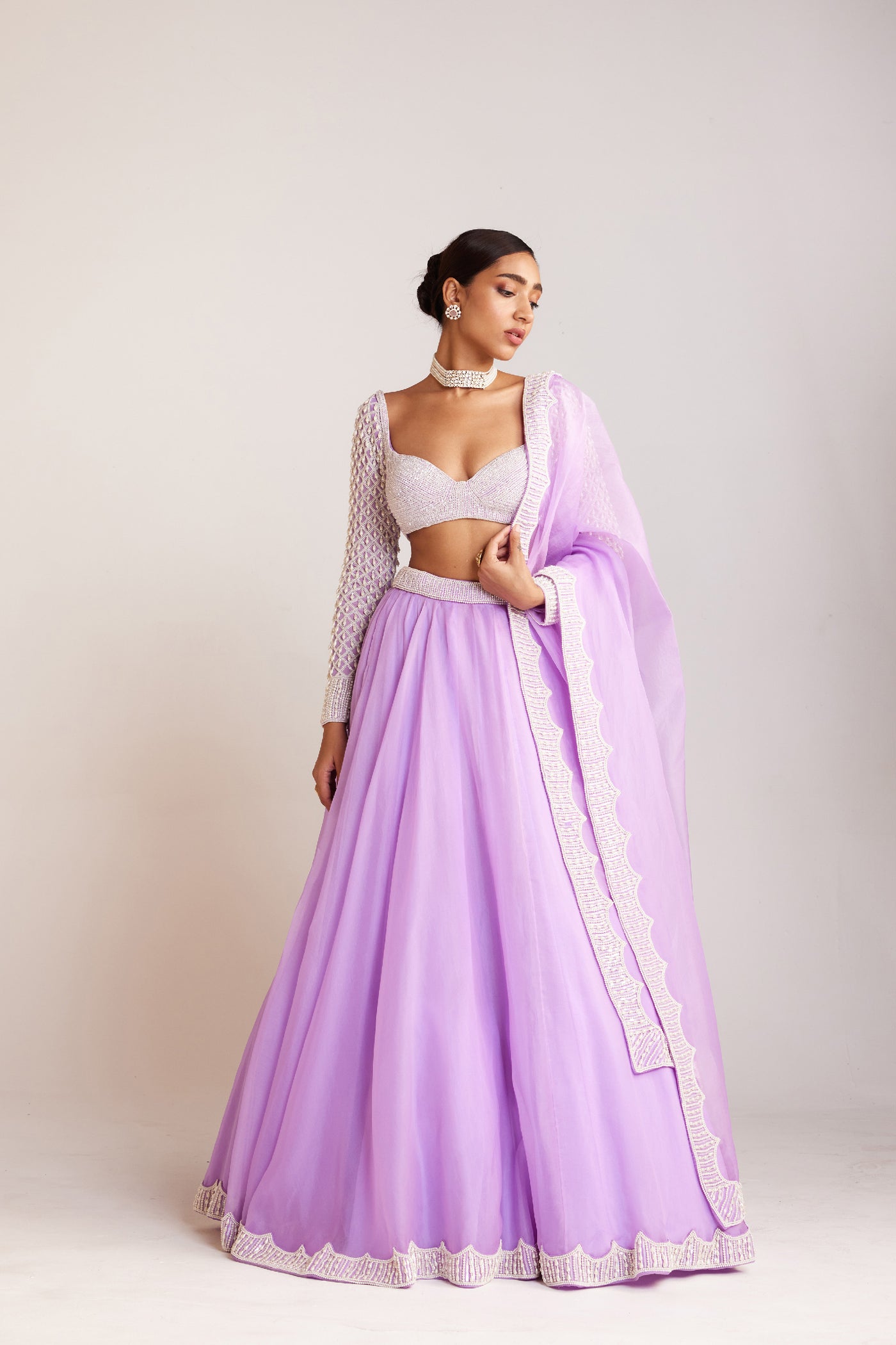 V Vani Vats Lilac Pearl Embellished Organza Lehenga Paired With Sweetheart Neck Pearl Drop Full Sleeve Blouse Indian designer wear online shopping melange singapore