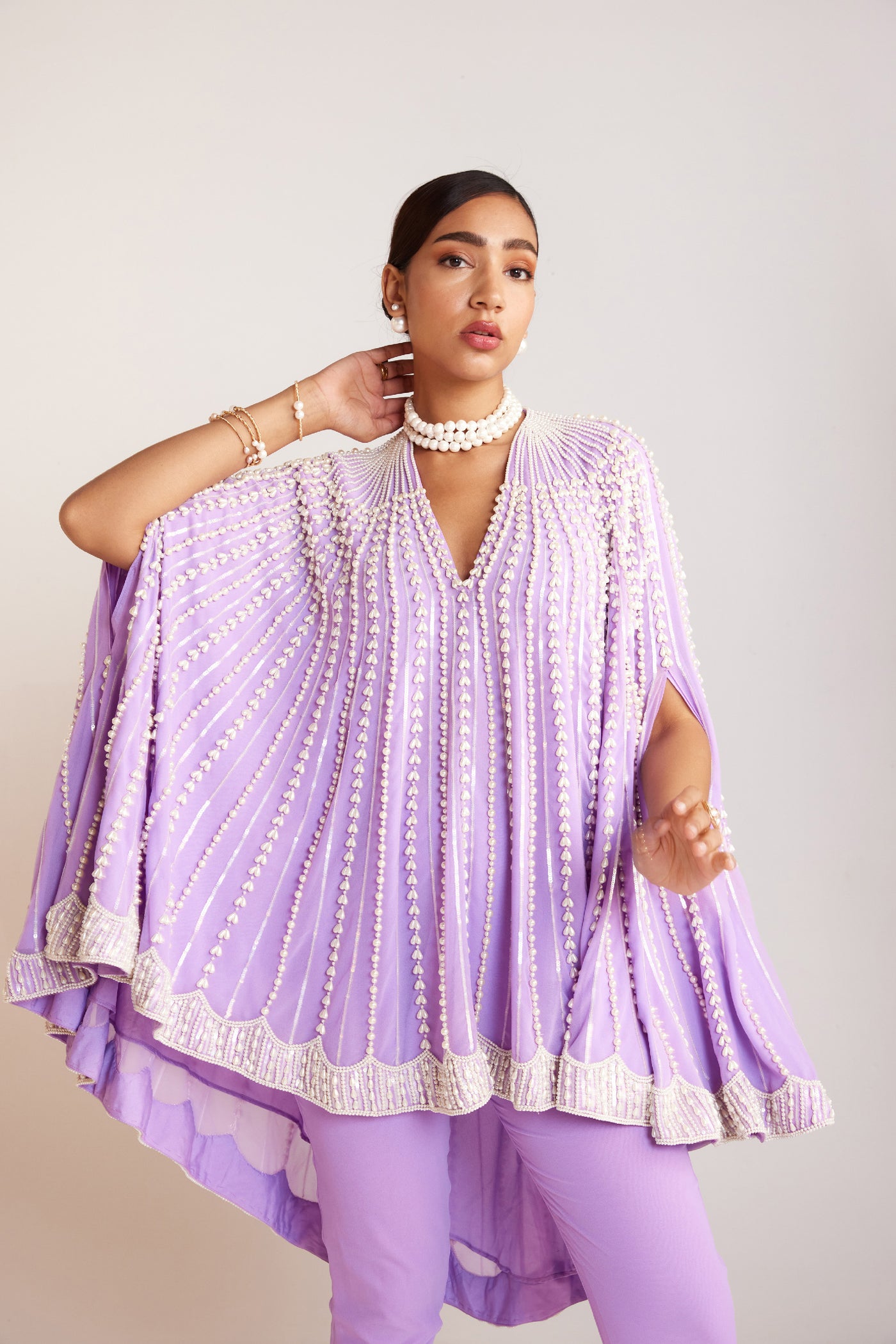 V Vani Vats Pearl Embellished Lilac Asymmetrical Cape Paired With Pants Indian designer wear online shopping melange singapore