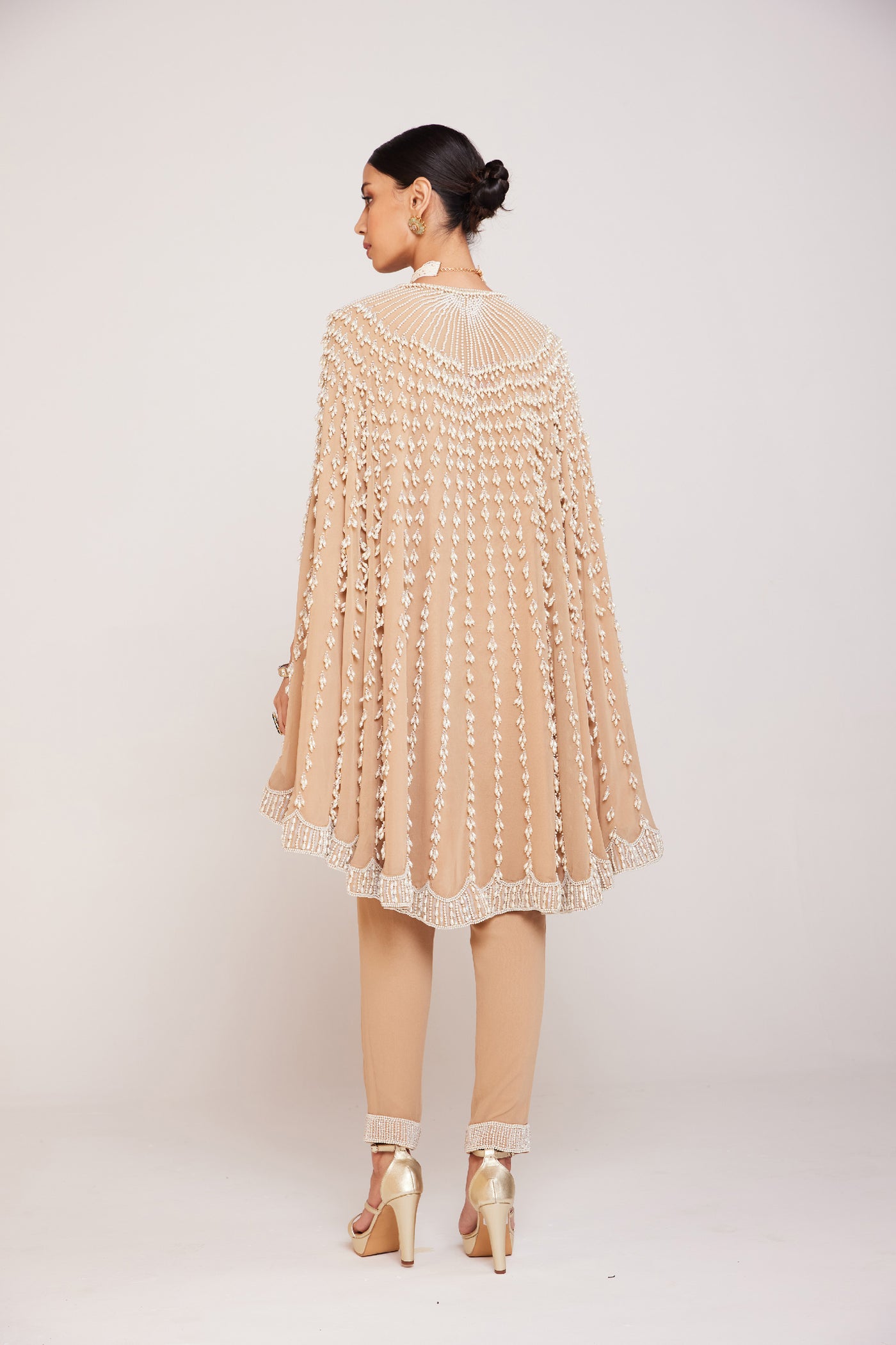 V Vani Vats Pearl Embellished Beige Asymmetrical Cape Paired With Pants Indian designer wear online shopping melange singapore