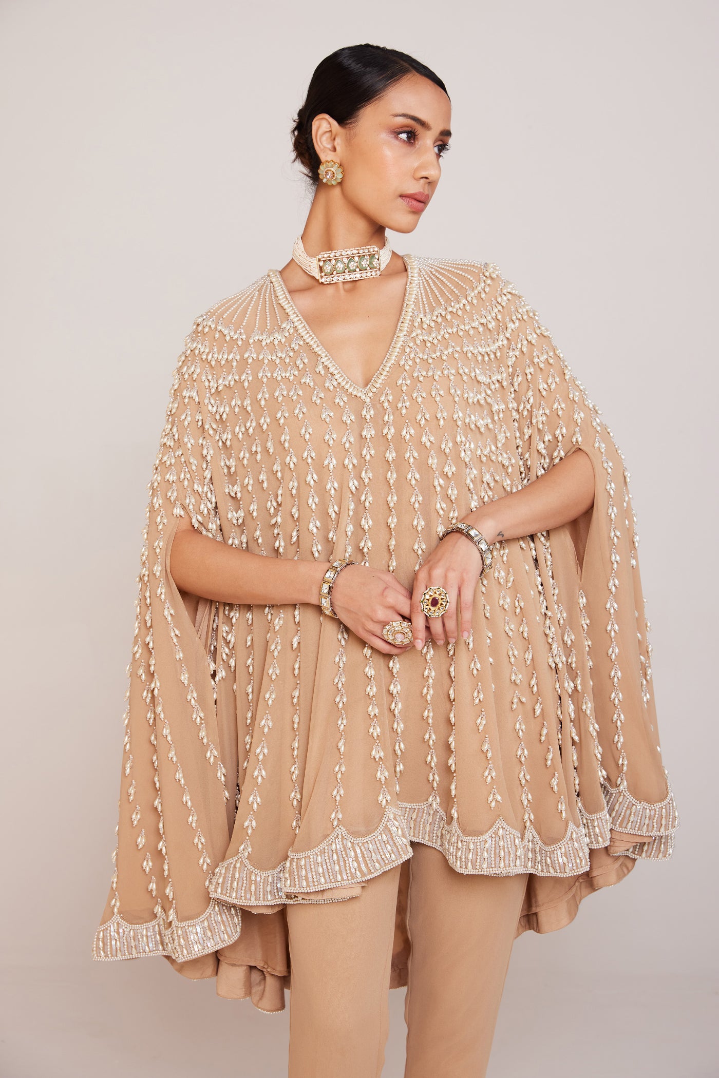 V Vani Vats Pearl Embellished Beige Asymmetrical Cape Paired With Pants Indian designer wear online shopping melange singapore