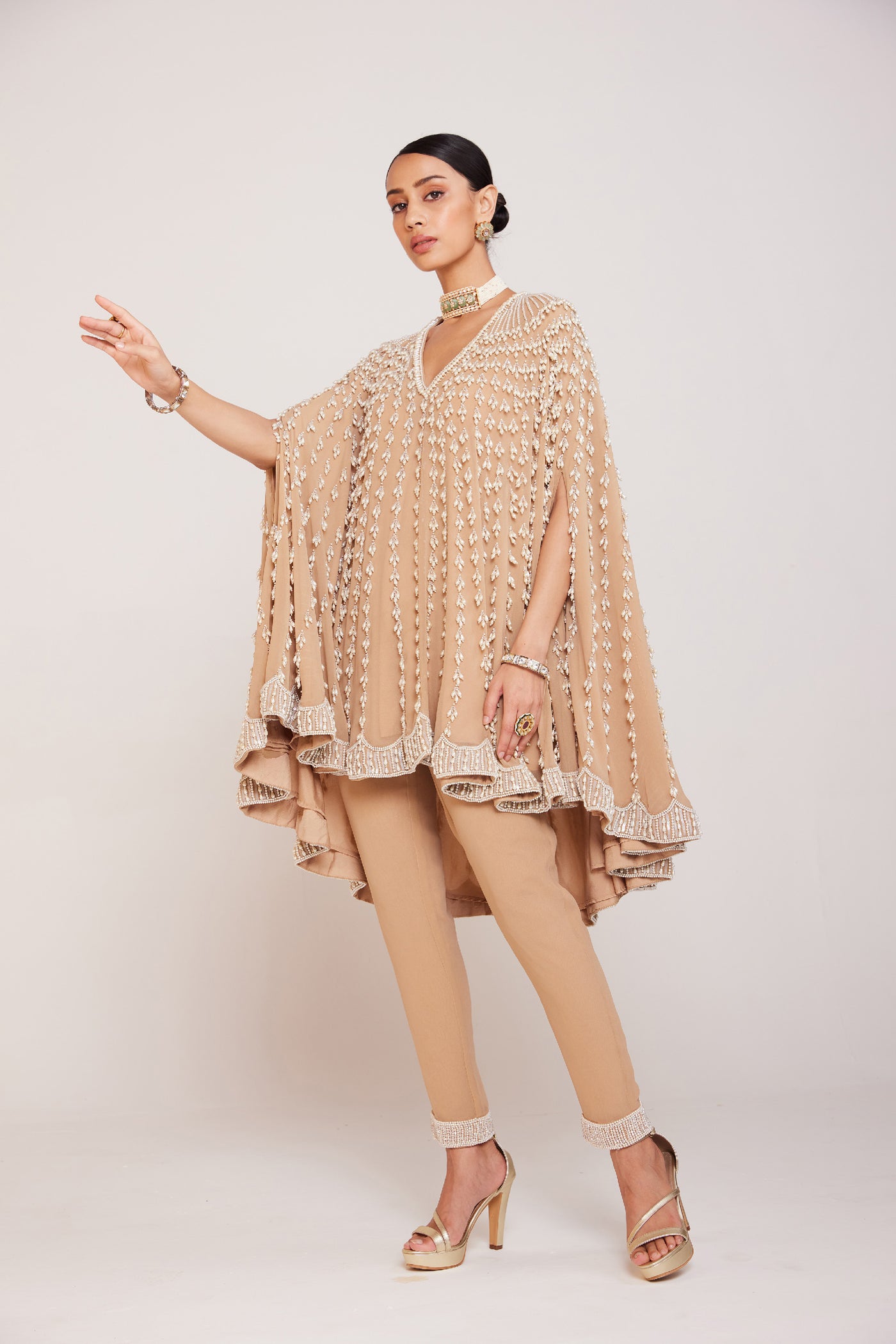 V Vani Vats Pearl Embellished Beige Asymmetrical Cape Paired With Pants Indian designer wear online shopping melange singapore