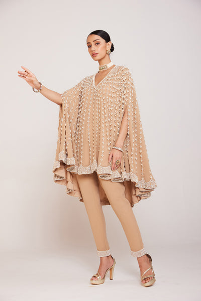 V Vani Vats Pearl Embellished Beige Asymmetrical Cape Paired With Pants Indian designer wear online shopping melange singapore