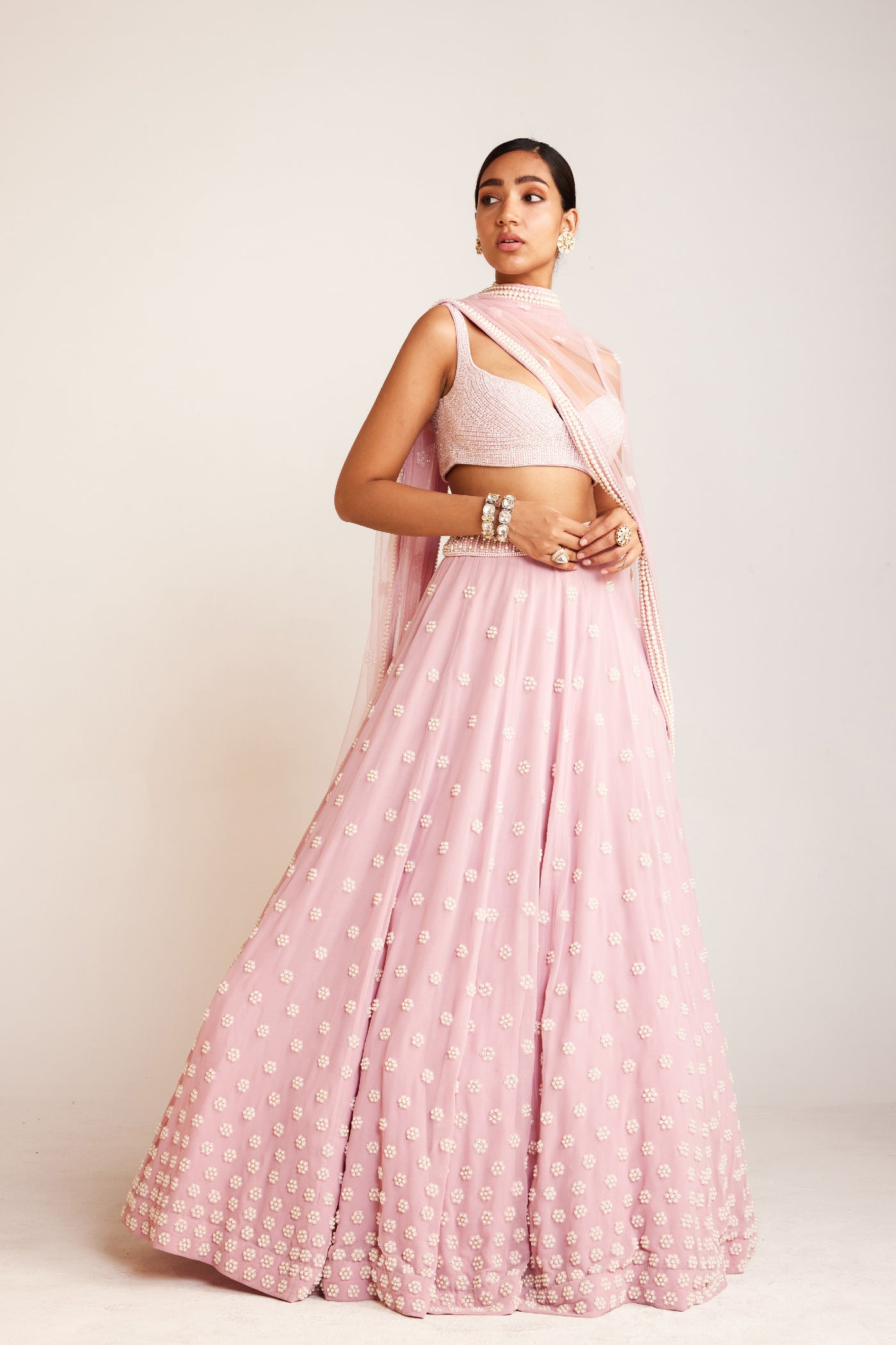 V Vani Vats Powder Pink Pearl Flower Lehenga Paired With Pearl Drop Full Sleeve Blouse Indian designer wear online shopping melange singapore
