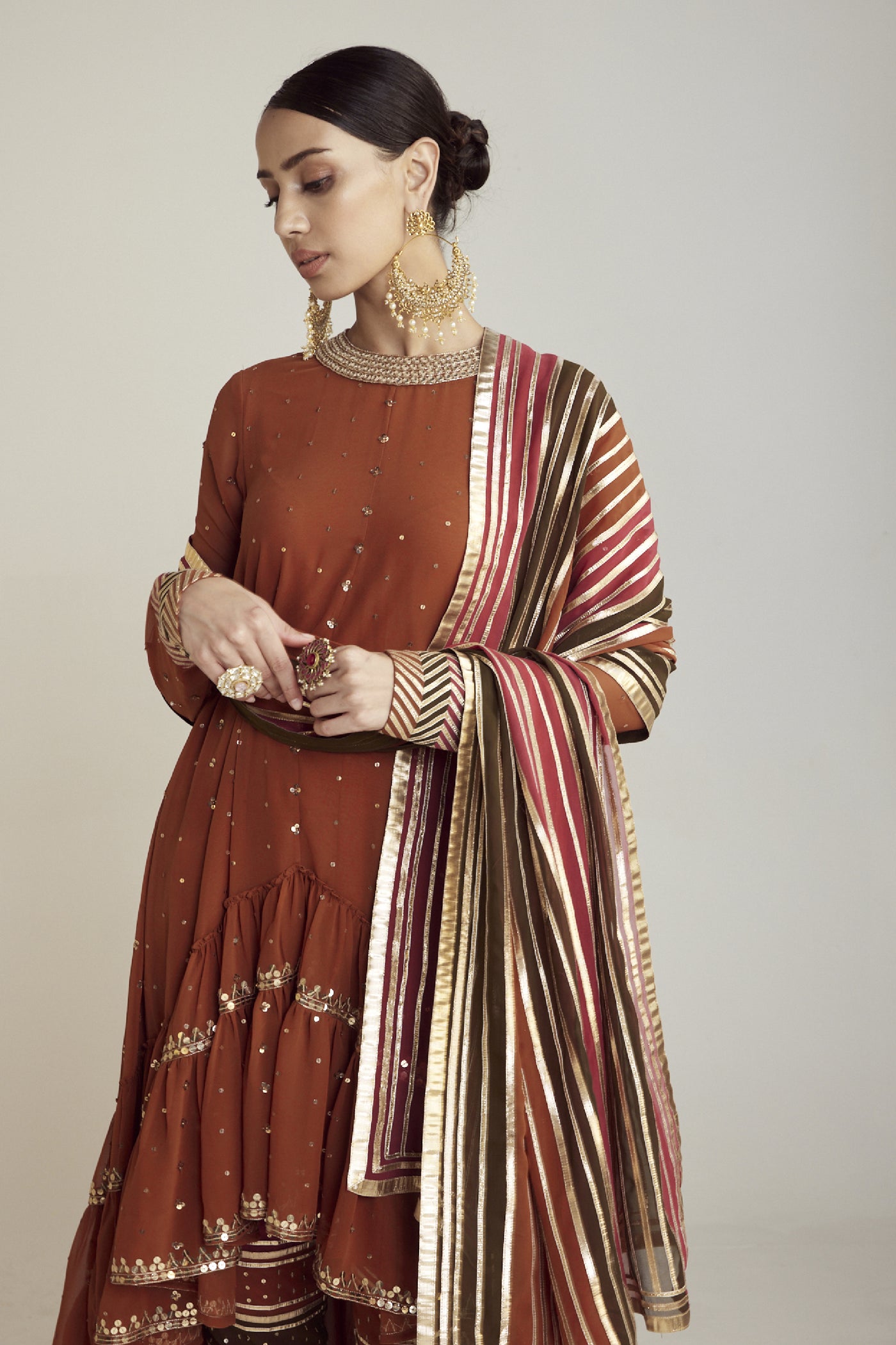 Vani Vats Rust Round Neck Asymmetrical Kurta Pant Set Indian designer wear online shopping melange singapore 