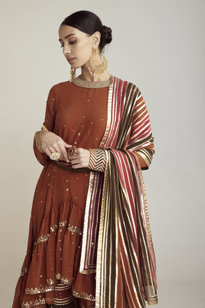 Vani Vats Rust Round Neck Asymmetrical Kurta Pant Set Indian designer wear online shopping melange singapore