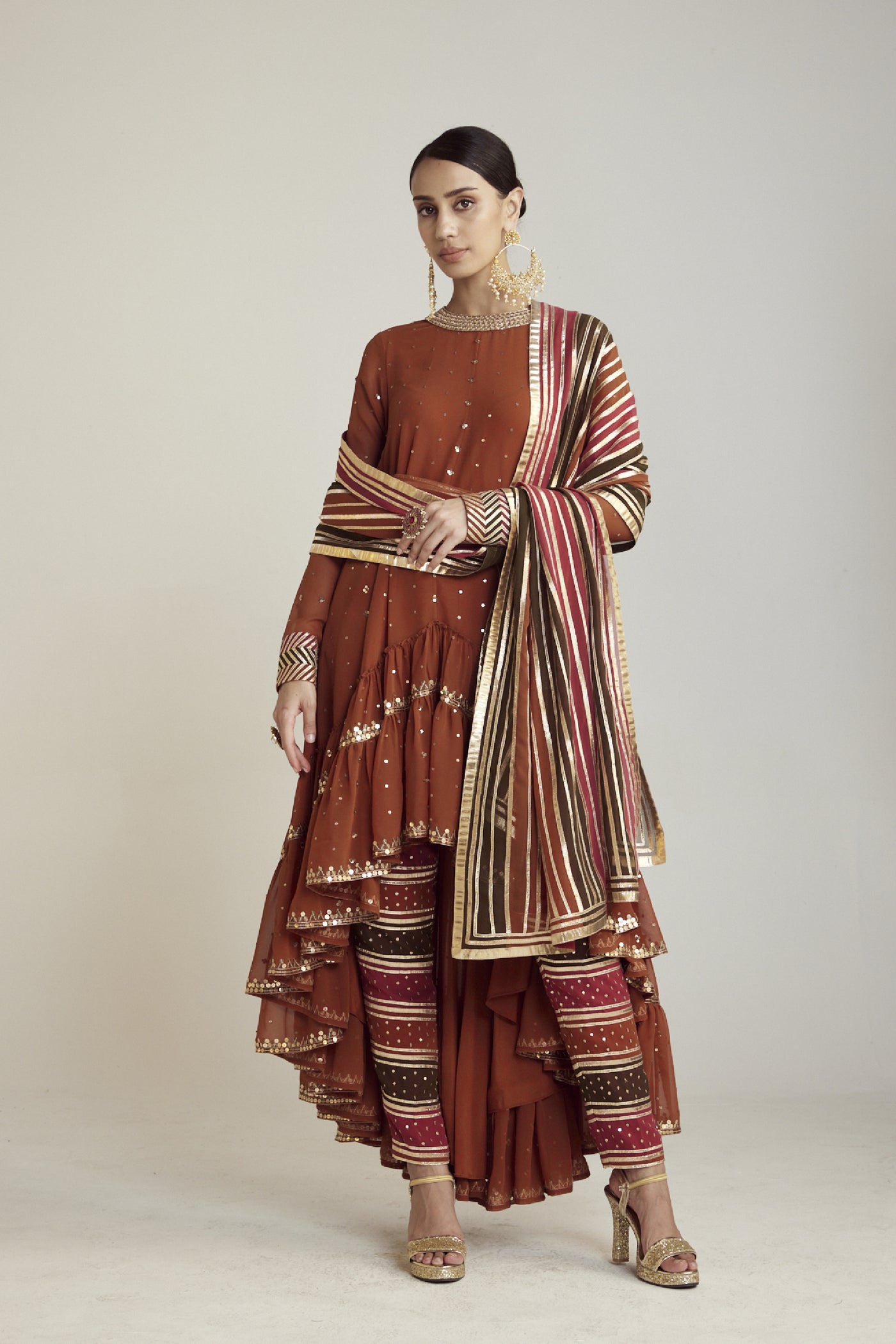 Vani Vats Rust Round Neck Asymmetrical Kurta Pant Set Indian designer wear online shopping melange singapore