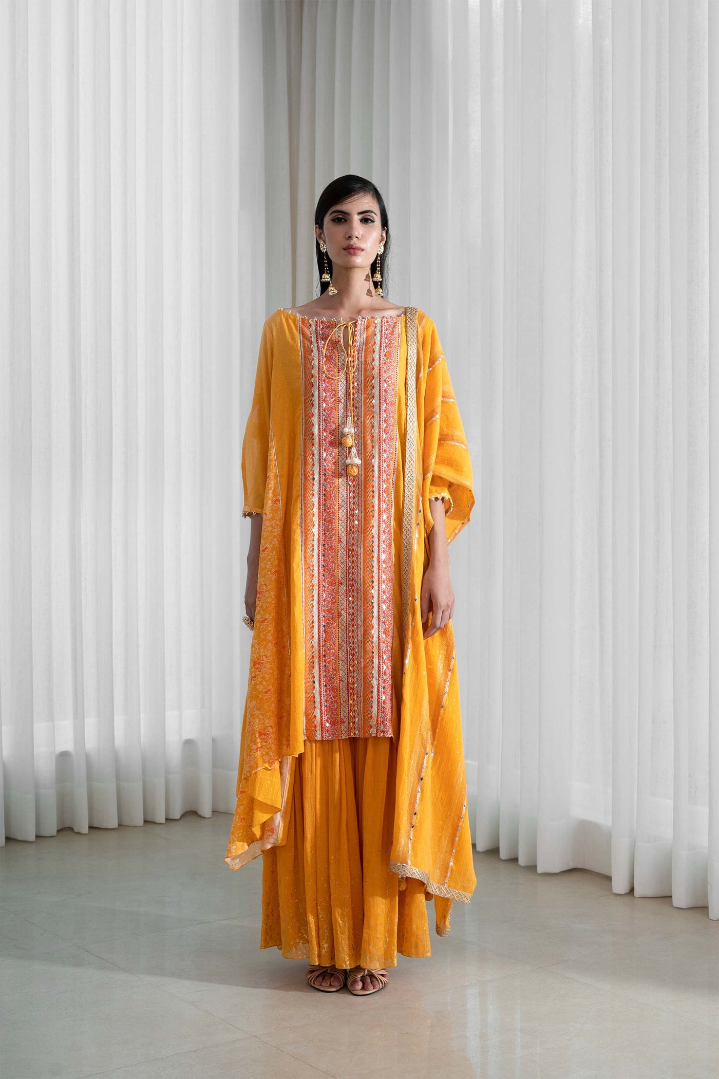 Mandira Wirk Flared Panelled Kurta And Sharara Set mustard yellow festive indian designer wear online shopping melange singapore