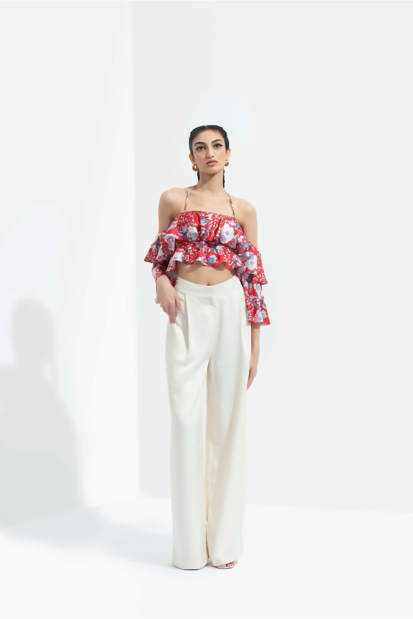 Mandira Wirk Ajisia printed satin layered cold shoulder top paired with ivory trouser red western indian designer wear online shopping melange singapore