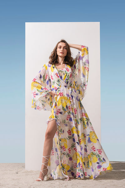 Mandira Wirk Chiffon printed long dress with cowled neckline, brasso printed yoke, front slits bottom with frills yellow western indian designer wear online shopping melange singapore 