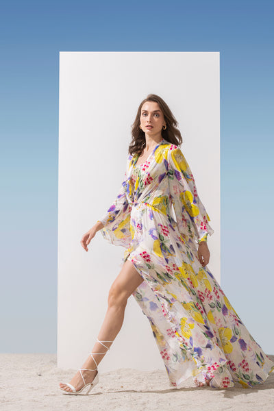 Mandira Wirk Chiffon printed long dress with cowled neckline, brasso printed yoke, front slits bottom with frills yellow western indian designer wear online shopping melange singapore 