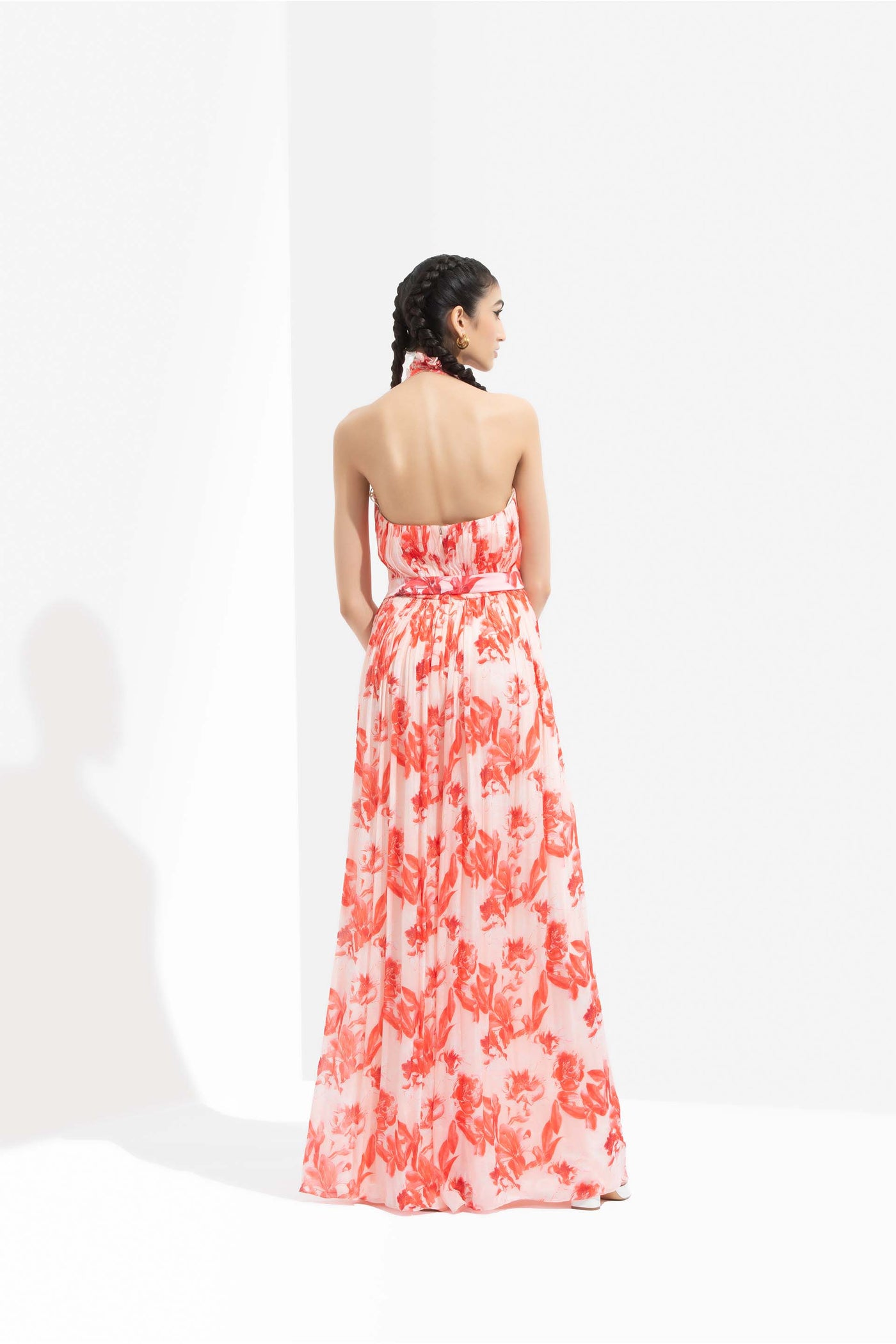 mandira wirk Mirrai printed chiffon low neckline jumpsuit with halter neck and low back orange western indian designer wear online shopping melange singapore