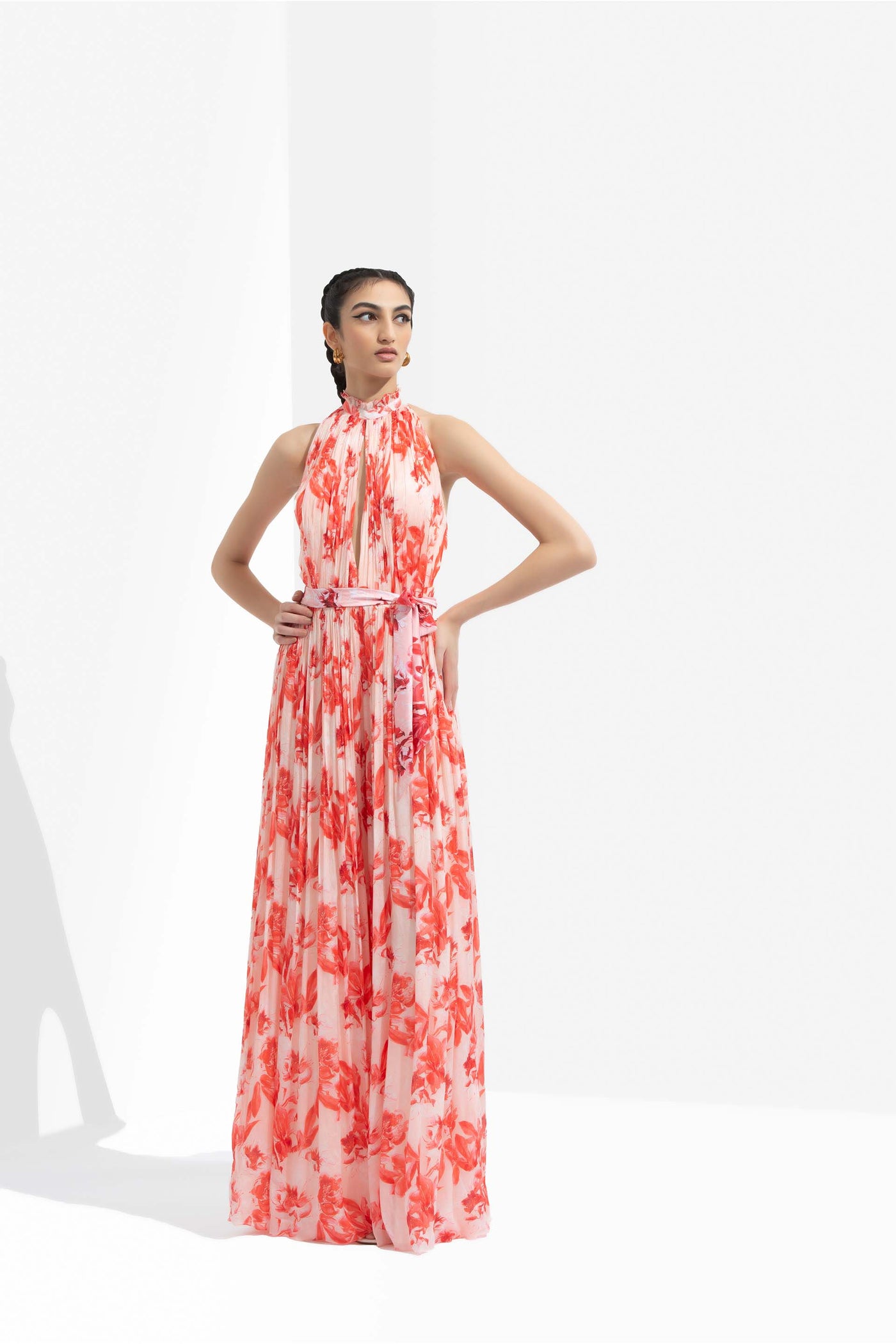 mandira wirk Mirrai printed chiffon low neckline jumpsuit with halter neck and low back orange western indian designer wear online shopping melange singapore