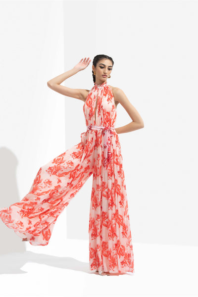 mandira wirk Mirrai printed chiffon low neckline jumpsuit with halter neck and low back orange western indian designer wear online shopping melange singapore