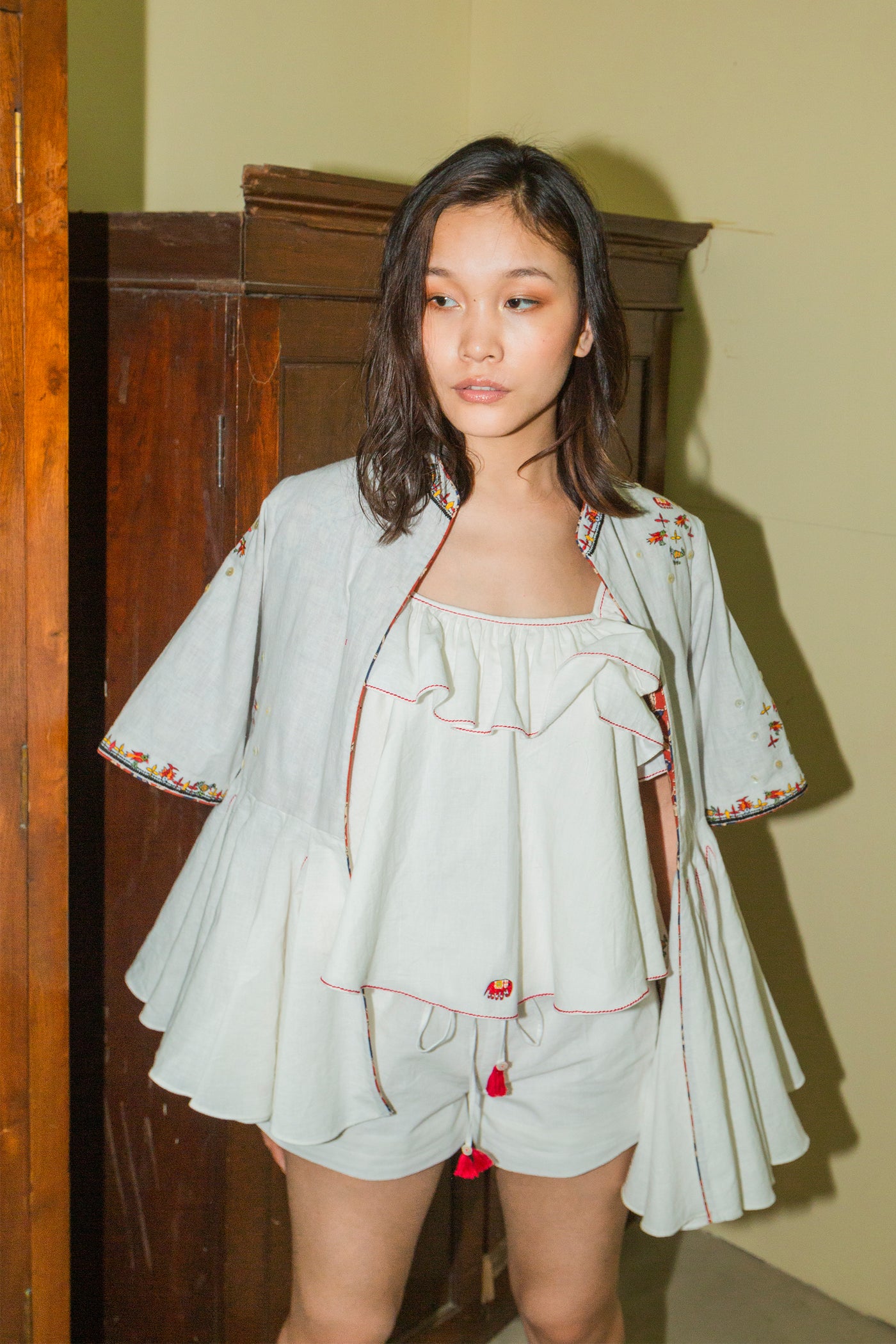 Nika Nikasha Hand woven embroidered peplum jacket white Indian Designer wear Melange Singapore Online Shopping Sustainable fashion clothing