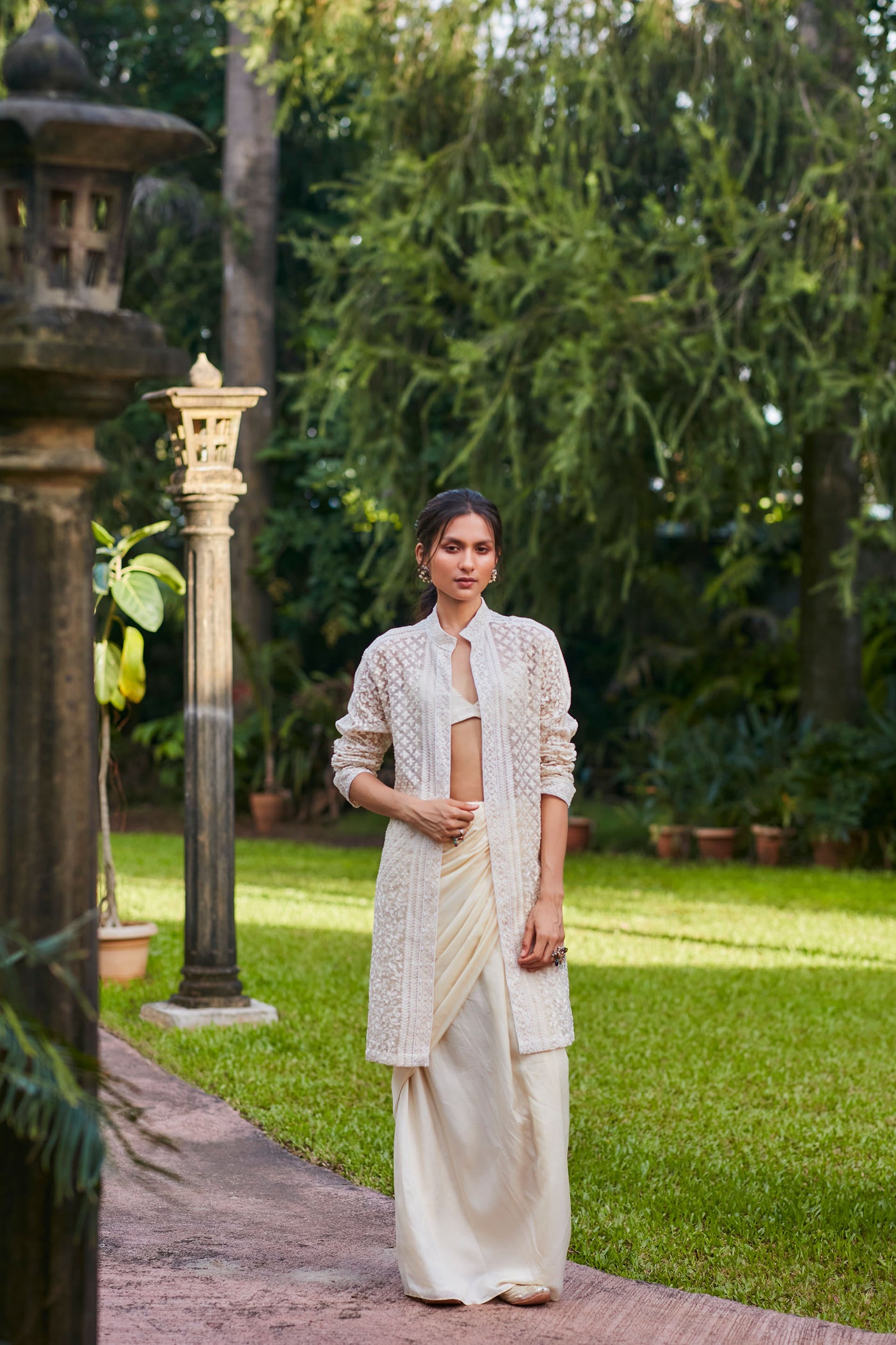 sva by sonam and paras modi  Beige saree drape skirt with bustier and open sherwani jacket Festive fusion Indian designer wear online shopping melange singapore indian designer wear