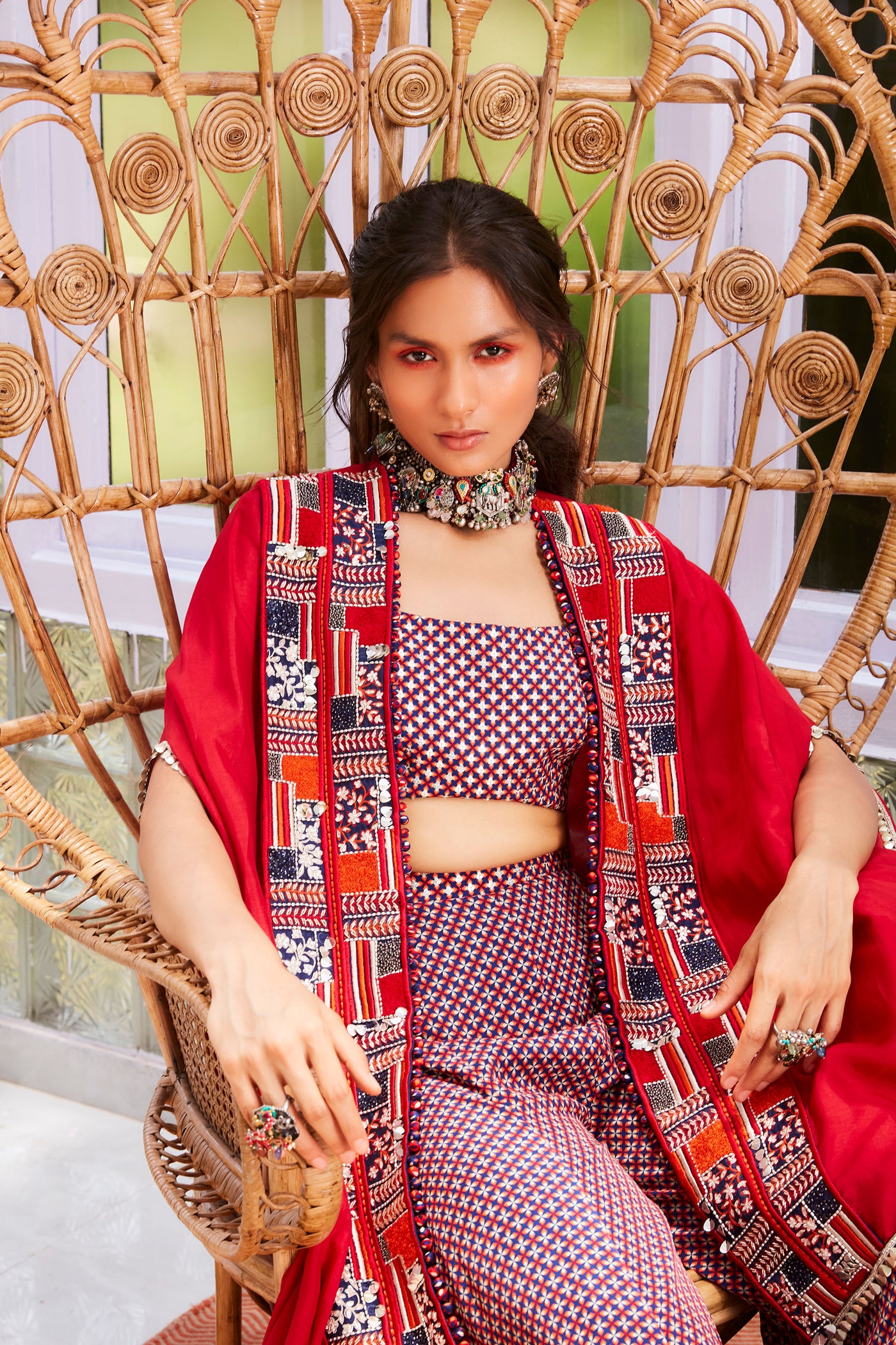 sva by sonam and paras modi Blue geo rasa print sharara with blue geo print rasa  bustier and solid red cape with patchwork print border  Festive fusion Indian designer wear online shopping melange singapore indian designer wear