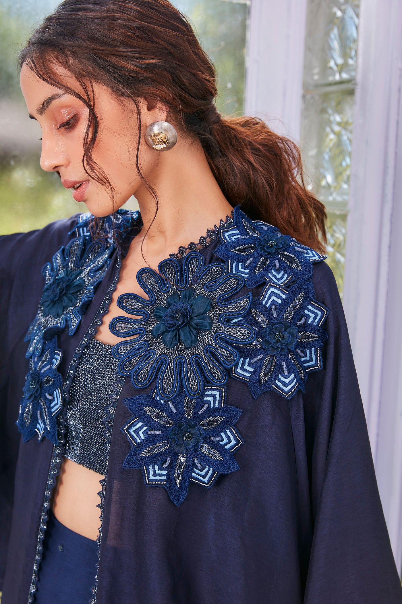 sva by sonam and paras modi Deep Blue Drape Skirt With Fully Embroidered Bustier And Cape With Appliqué Flowers Festive fusion Indian designer wear online shopping melange singapore indian designer wear
