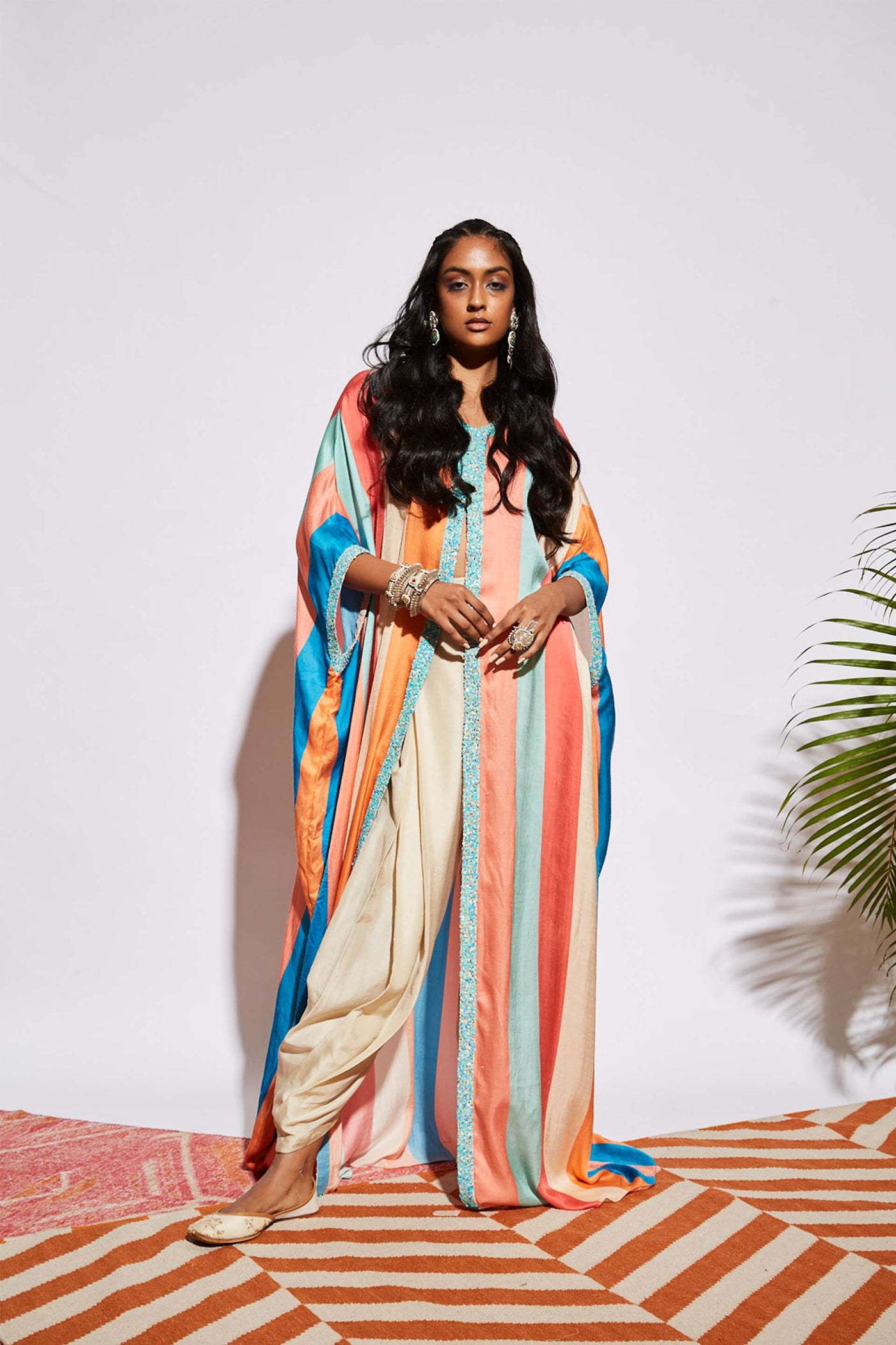 Designer cape jacket outlet