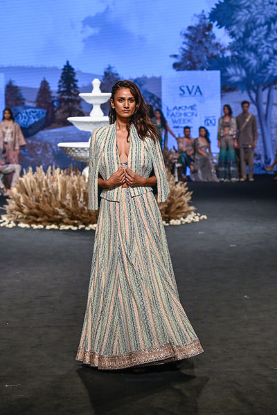 SVA Stripe printed lucknowi lehnga teamed with a patchwork corset and structured cape jacket western womenswear designer fashion online shopping melange singapore