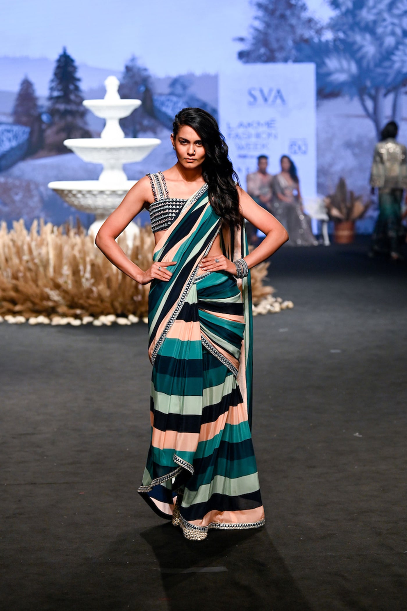 SVA Stripe print pre stitched cascase saree teamed with an embellished bandeau blouse  western womenswear designer fashion online shopping melange singapore