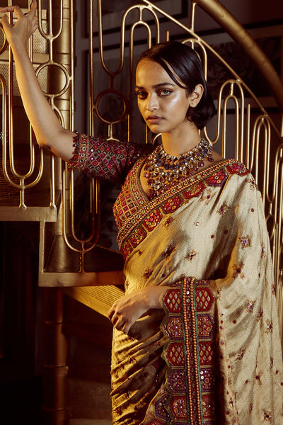Tarun Tahiliani Brocade Saree With Toran Border With Resham And Mirror-Embroidered Blouse Embellished With Fringes gold festive indian designer wear online shopping melange singapore