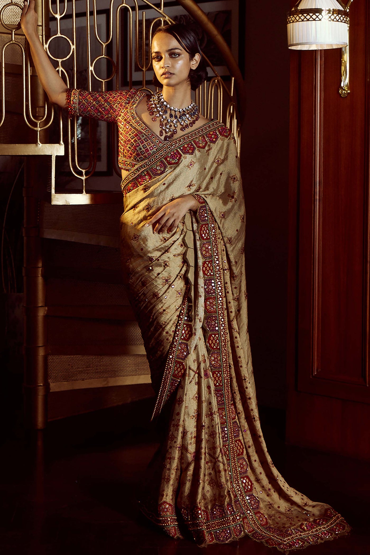 Tarun Tahiliani Brocade Saree With Toran Border With Resham And Mirror-Embroidered Blouse Embellished With Fringes gold festive indian designer wear online shopping melange singapore