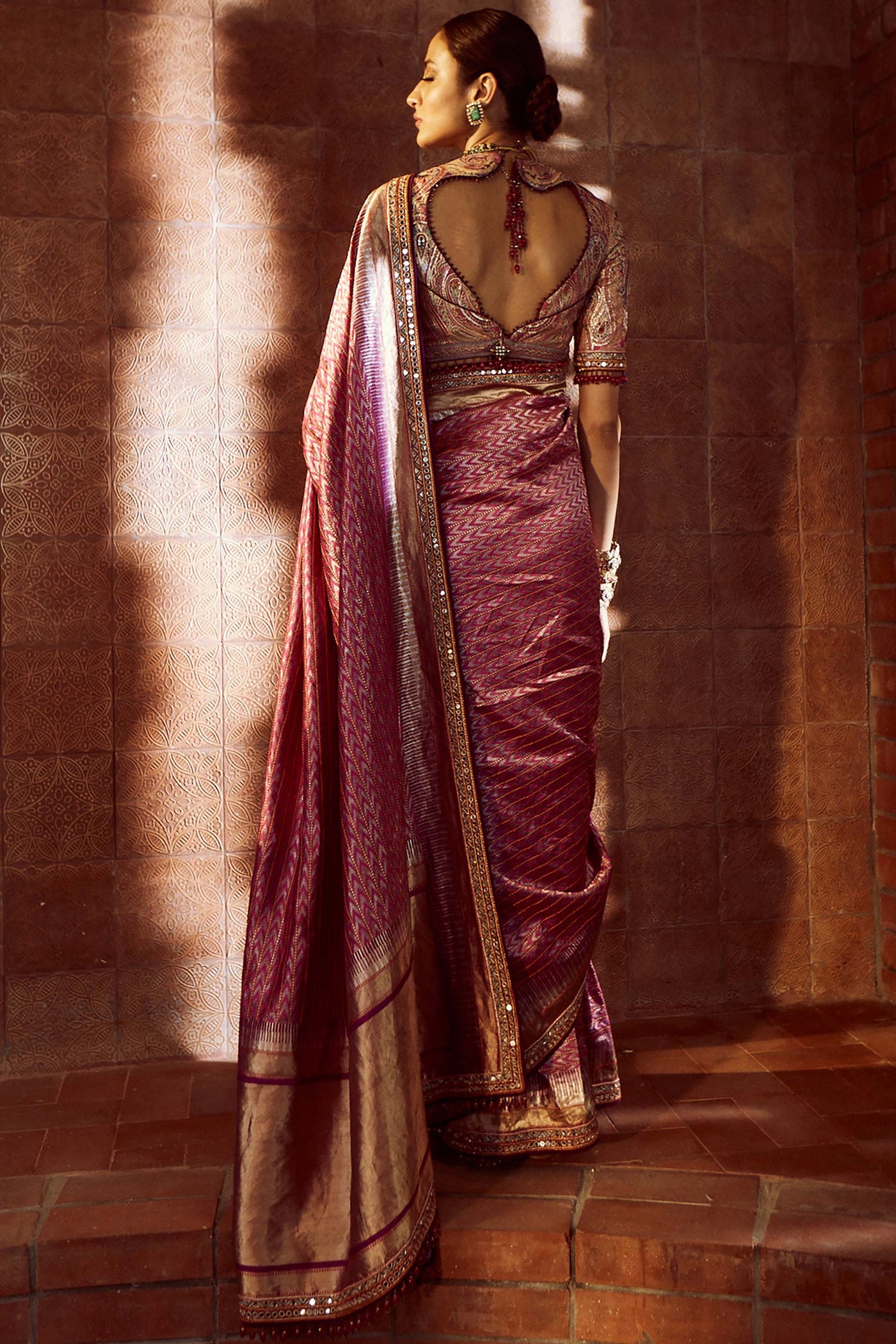 Tarun Tahilaini Silk Ikat Saree With Hand-Embroidered Mirror Border And Jamewar Blouse With Aari Embroidery, Embellished With Fringes magenta festive indian designer wear online shopping melange singapore