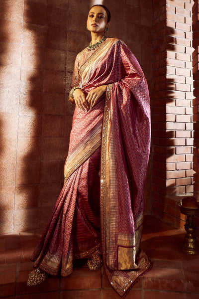 Tarun Tahilaini Silk Ikat Saree With Hand-Embroidered Mirror Border And Jamewar Blouse With Aari Embroidery, Embellished With Fringes magenta festive indian designer wear online shopping melange singapore 
