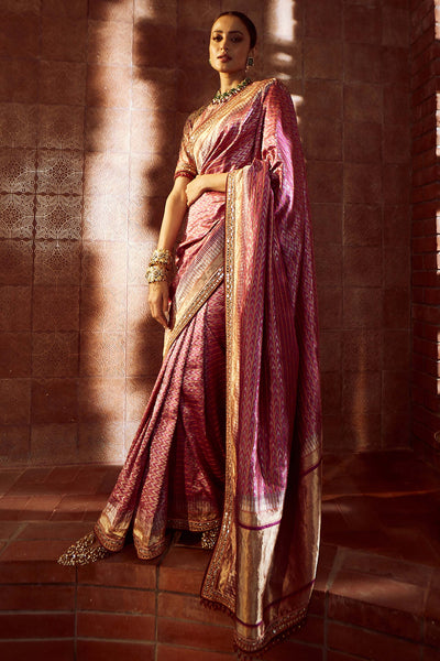 Tarun Tahilaini Silk Ikat Saree With Hand-Embroidered Mirror Border And Jamewar Blouse With Aari Embroidery, Embellished With Fringes magenta festive indian designer wear online shopping melange singapore