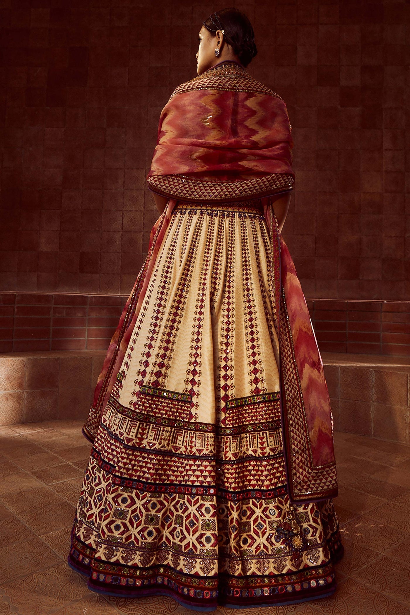 Tarun Tahiliani Stylised Kalidar Lehenga With Patchwork Of Zardozi And Aari Embroidery, Paired With Mirror And Resham-Embroidered Corset And Hand-Printed Dupatta multicolor festive indian designer wear online shopping melange singapore