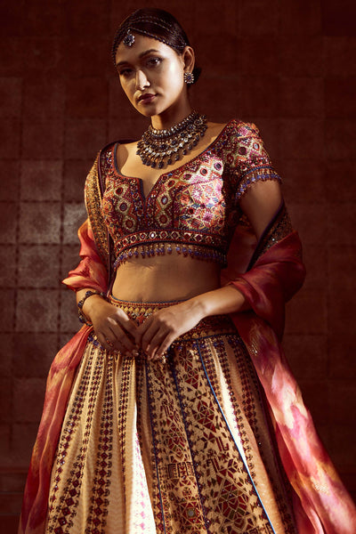 Tarun Tahilaini Stylised Kalidar Lehenga With Patchwork Of Zardozi And Aari Embroidery, Paired With Mirror And Resham-Embroidered Blouse And Hand-Printed Dupatta multicolor festive indian designer wear online shopping melange singapor