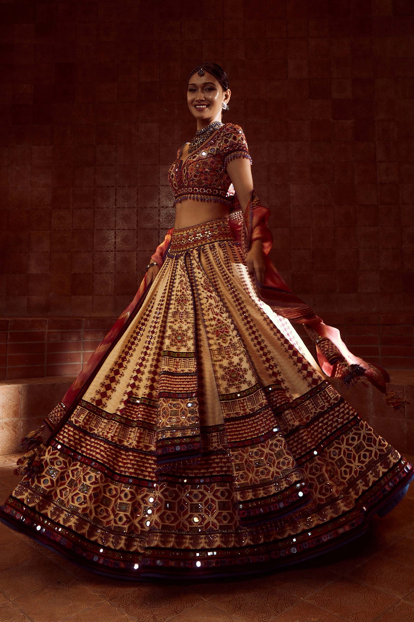Tarun Tahilaini Stylised Kalidar Lehenga With Patchwork Of Zardozi And Aari Embroidery, Paired With Mirror And Resham-Embroidered Blouse And Hand-Printed Dupatta multicolor festive indian designer wear online shopping melange singapore 